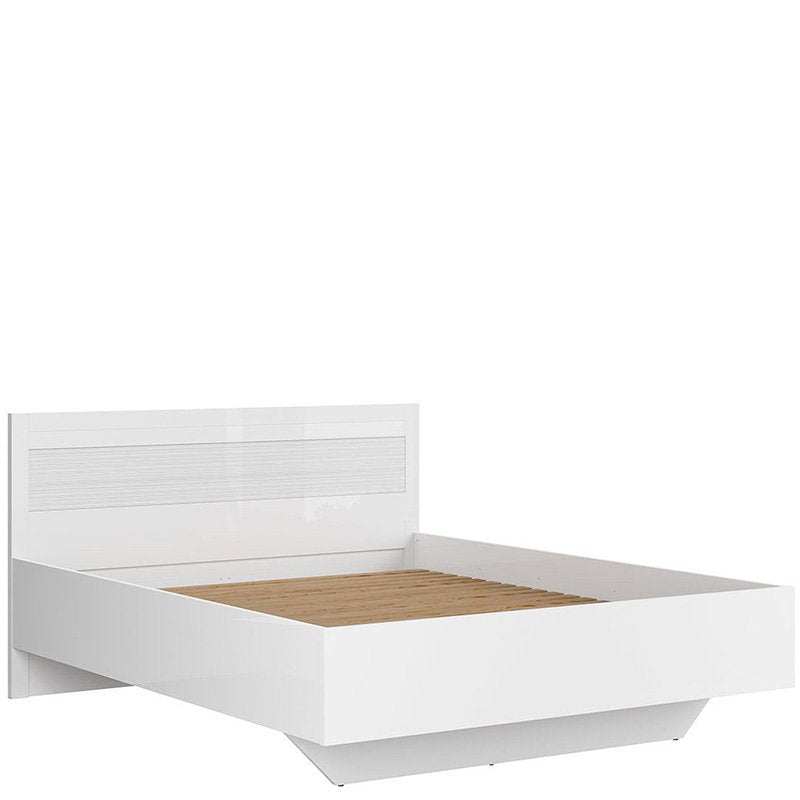 Modern white king size bed with high gloss finish and grooved headboard, wooden slats included, flat-packed for assembly