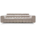 Modular sofa ZURICH with rounded design, vertical seams, adjustable headrests, and fabric upholstery in beige tones